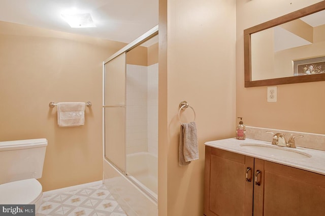 927 Brick Manor Cir, Silver Spring, MD 20905 - bathroom with toilet, vanity, and shower / bath combination with glass door