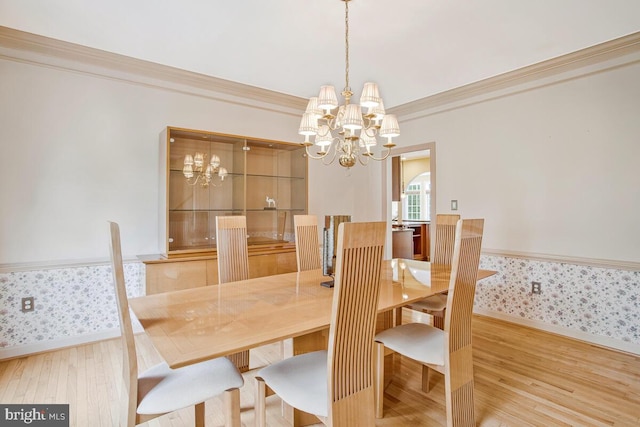 927 Brick Manor Cir, Silver Spring, MD 20905 - dining room featuring a chandelier, wood finished floors, wallpapered walls, baseboards, and crown molding