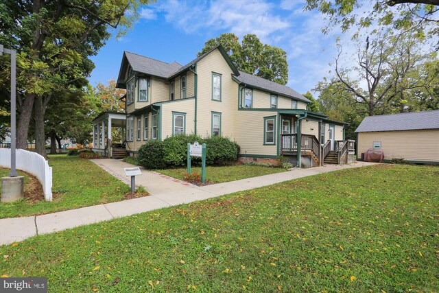 567 Pelican Ave, Gaithersburg, MD 20877 - view of side of property featuring a lawn