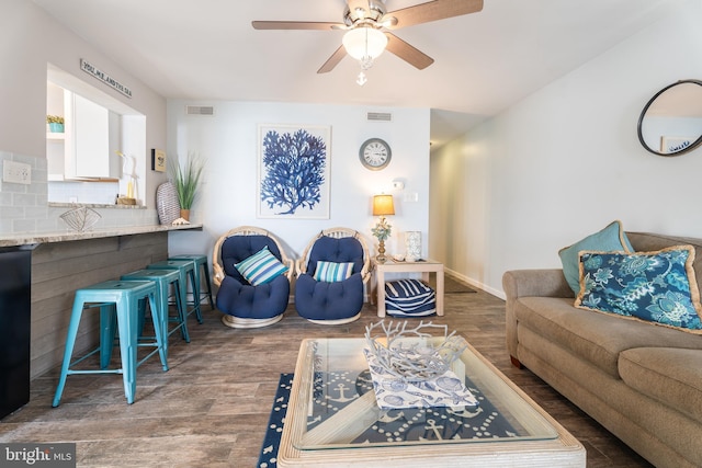 183 Jamestown Rd Unit 10, Ocean City, MD 21842 - living room with wood finished floors, a ceiling fan, and baseboards