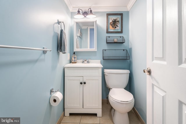 183 Jamestown Rd Unit 10, Ocean City, MD 21842 - bathroom with toilet, vanity, baseboards, crown molding, and tile patterned flooring