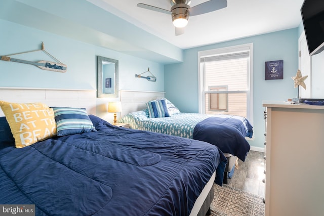 183 Jamestown Rd Unit 10, Ocean City, MD 21842 - bedroom featuring wood finished floors, a ceiling fan, and baseboards