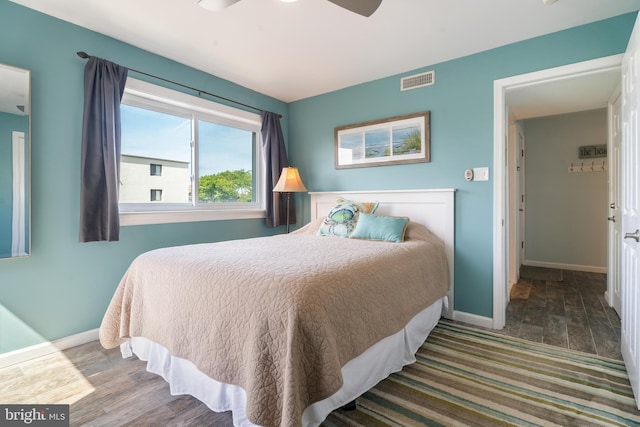183 Jamestown Rd Unit 10, Ocean City, MD 21842 - bedroom featuring baseboards, wood finished floors, and a ceiling fan