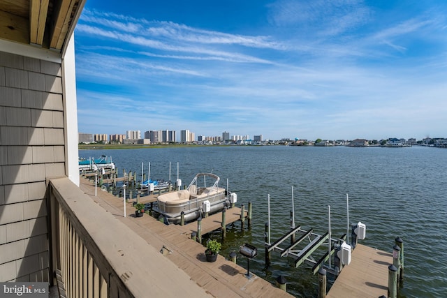 183 Jamestown Rd Unit 10, Ocean City, MD 21842 - dock area with a water view, boat lift, and a skyline view