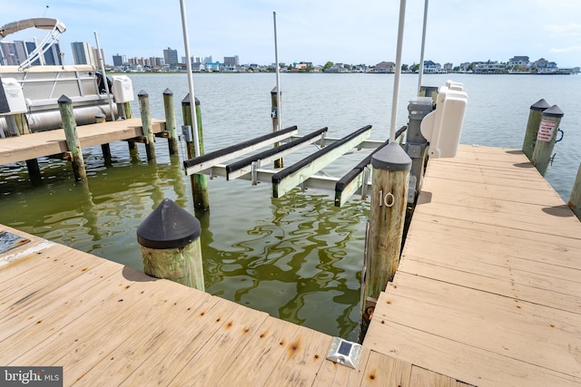 183 Jamestown Rd Unit 10, Ocean City, MD 21842 - dock area featuring boat lift, a view of skyline, and a water view