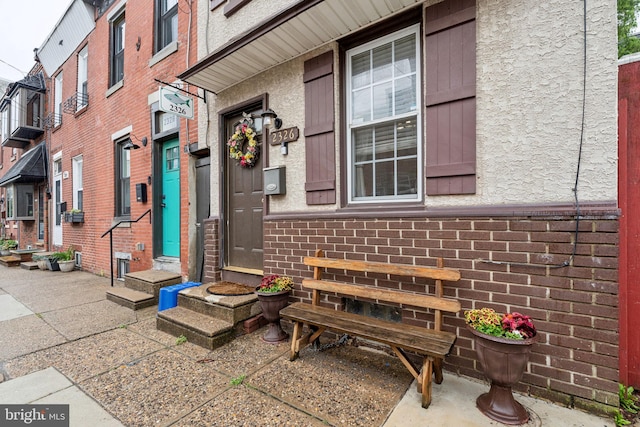 2326 E Boston St, Philadelphia, PA 19125 - doorway to property featuring brick siding