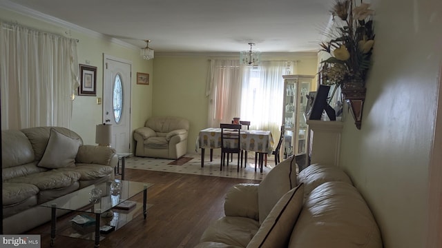 1611 Parham Rd, Silver Spring, MD 20903 - living area with wood-type flooring, ornamental molding, and a chandelier