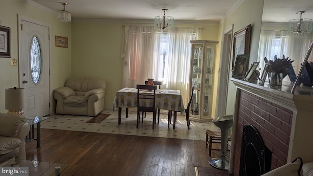 1611 Parham Rd, Silver Spring, MD 20903 - dining space featuring a chandelier, healthy amount of natural light, hardwood / wood-style flooring, and ornamental molding