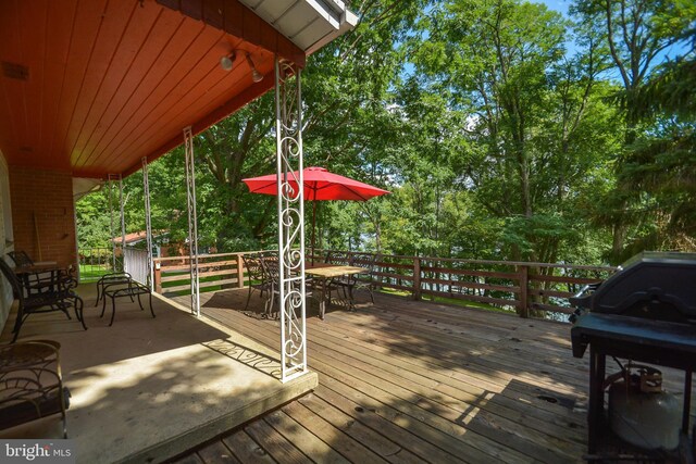 1417 Marsh Hill Rd, Mc Henry, MD 21541 - wooden deck with view of wooded area and outdoor dining area