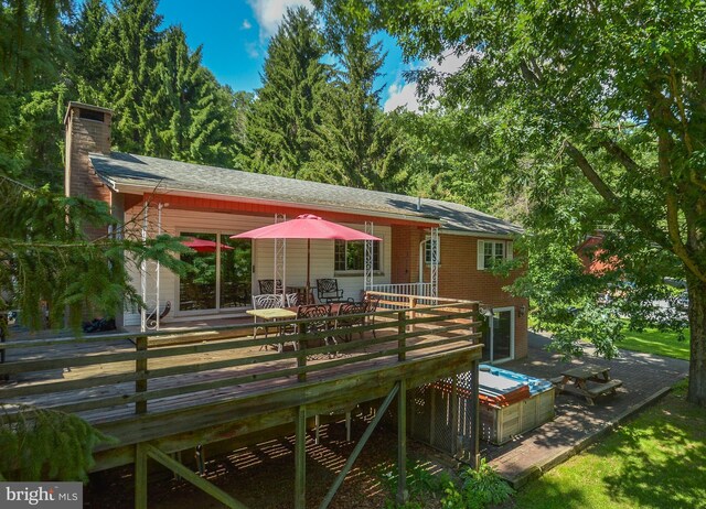 1417 Marsh Hill Rd, Mc Henry, MD 21541 - back of property featuring a wooden deck, a chimney, and brick siding