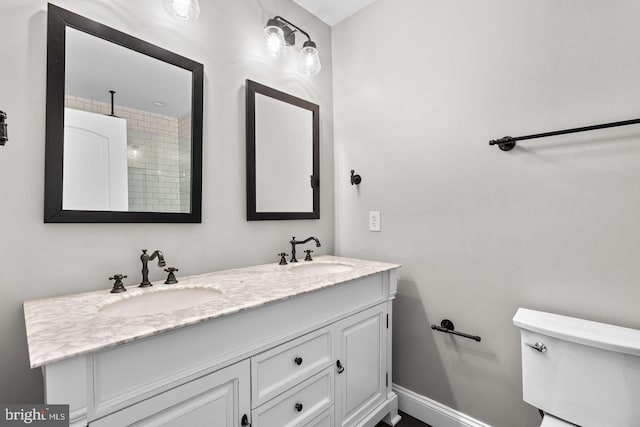 2714 Fait Ave, Baltimore, MD 21224 - bathroom with toilet, double vanity, and tiled shower