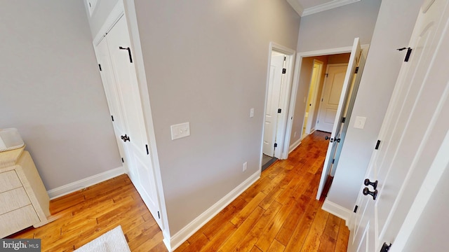 2714 Fait Ave, Baltimore, MD 21224 - hallway with light wood-style floors, ornamental molding, and baseboards