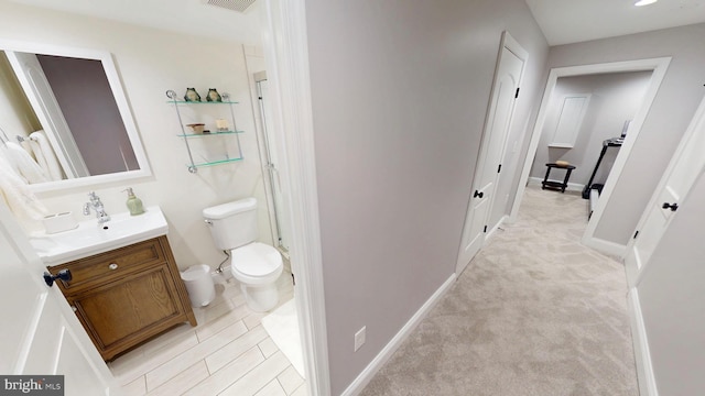 2714 Fait Ave, Baltimore, MD 21224 - bathroom with vanity, toilet, baseboards, and a shower