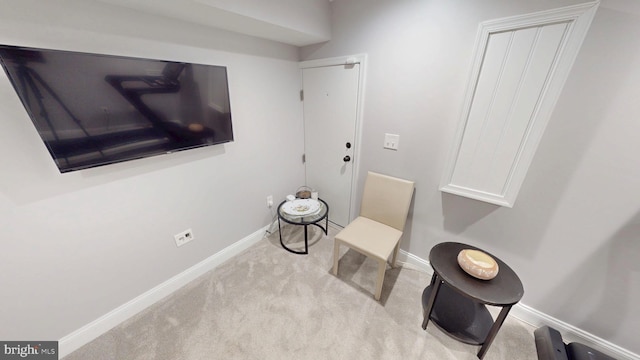 2714 Fait Ave, Baltimore, MD 21224 - living area with carpet flooring and baseboards