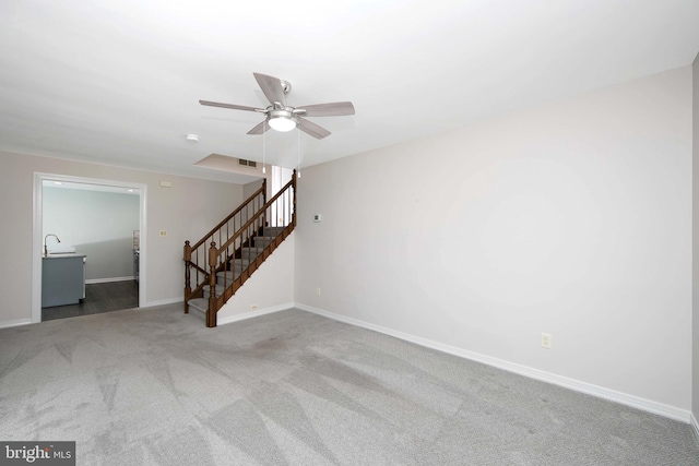 13 Briarcliff Rd, Marlton, NJ 08053 - carpeted spare room with ceiling fan, stairway, baseboards, and a sink