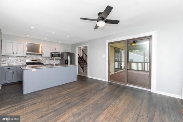 13 Briarcliff Rd, Marlton, NJ 08053 - kitchen with appliances with stainless steel finishes, wall chimney range hood, a ceiling fan, baseboards, and backsplash