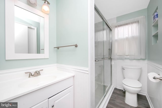 13 Briarcliff Rd, Marlton, NJ 08053 - bathroom with wainscoting, toilet, a shower stall, vanity, and wood finished floors
