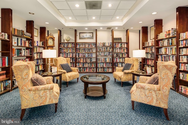 900 N Taylor St Unit 1631, Arlington, VA 22203 - sitting room featuring bookshelves, carpet flooring, a raised ceiling, and recessed lighting
