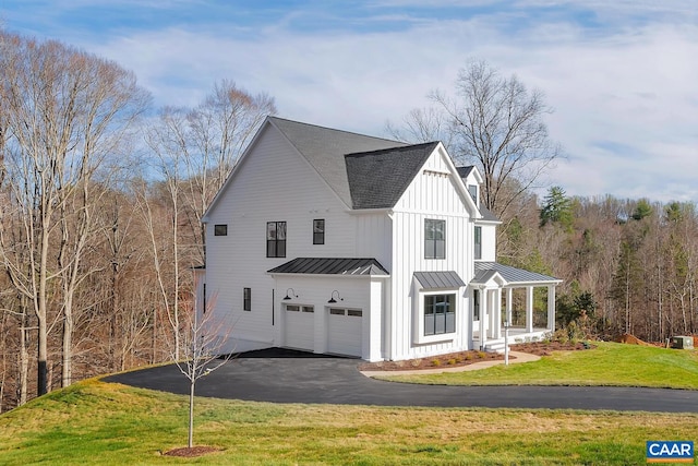 6119-2 Jarmans Gap Rd Lot 2Jarmans, Gap, Crozet, VA 22932 - view of front of property with a standing seam roof, a garage, asphalt driveway, a shingled roof, and a front yard
