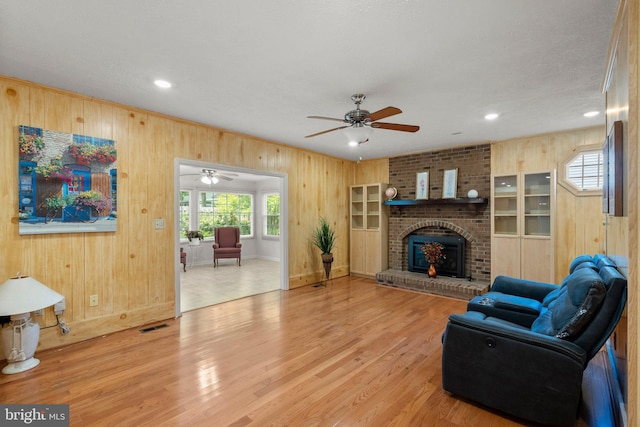 17220 Larosa Dr, Rockville, MD 20855 - living room with wooden walls, ceiling fan, wood finished floors, recessed lighting, and baseboards