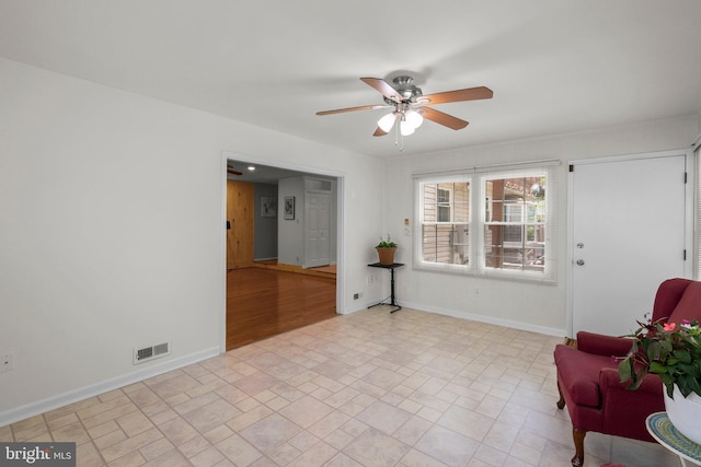 17220 Larosa Dr, Rockville, MD 20855 - living room with a ceiling fan and baseboards