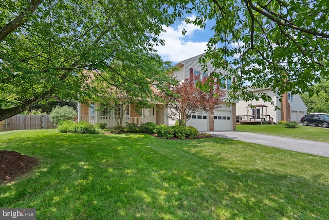 17220 Larosa Dr, Rockville, MD 20855 - obstructed view of property featuring driveway and an attached garage