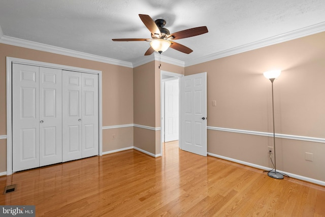 17220 Larosa Dr, Rockville, MD 20855 - unfurnished bedroom with light wood finished floors, a closet, baseboards, ceiling fan, and ornamental molding