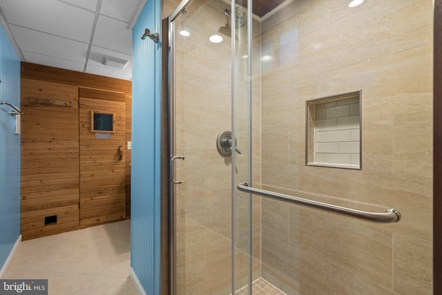 17220 Larosa Dr, Rockville, MD 20855 - bathroom with a stall shower, tile patterned flooring, and wooden walls