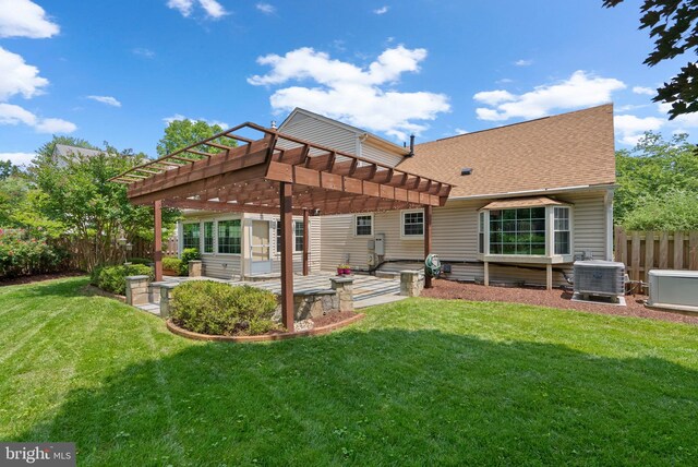 17220 Larosa Dr, Rockville, MD 20855 - back of house with central AC, a pergola, a patio area, and roof with shingles