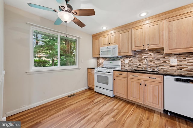 26 Anvil Rd, Aston, PA 19014 - kitchen with white appliances, a sink, light brown cabinets, dark countertops, and recessed lighting