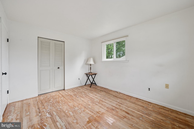 26 Anvil Rd, Aston, PA 19014 - unfurnished bedroom with wood finished floors, baseboards, and a closet