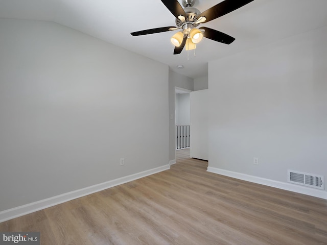 7907 Wallace Rd, Dundalk, MD 21222 - spare room featuring light wood-style flooring, baseboards, and ceiling fan