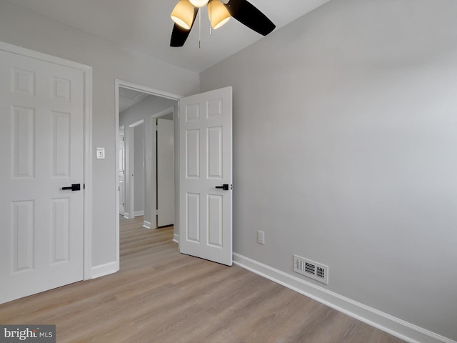 7907 Wallace Rd, Dundalk, MD 21222 - spare room with ceiling fan, baseboards, and light wood-style floors