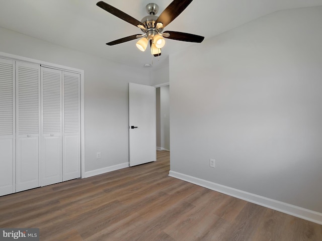 7907 Wallace Rd, Dundalk, MD 21222 - unfurnished bedroom featuring wood finished floors, baseboards, a closet, and ceiling fan