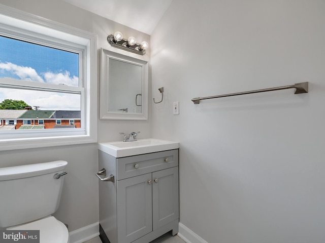 7907 Wallace Rd, Dundalk, MD 21222 - half bath with baseboards, toilet, and vanity