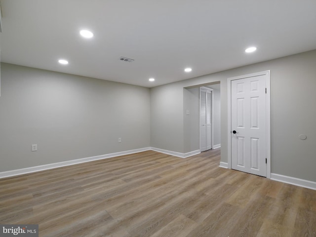 7907 Wallace Rd, Dundalk, MD 21222 - empty room with light wood-style flooring, recessed lighting, and baseboards