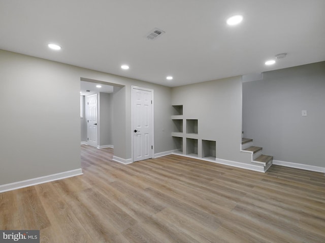 7907 Wallace Rd, Dundalk, MD 21222 - finished basement with recessed lighting, wood finished floors, baseboards, and stairs