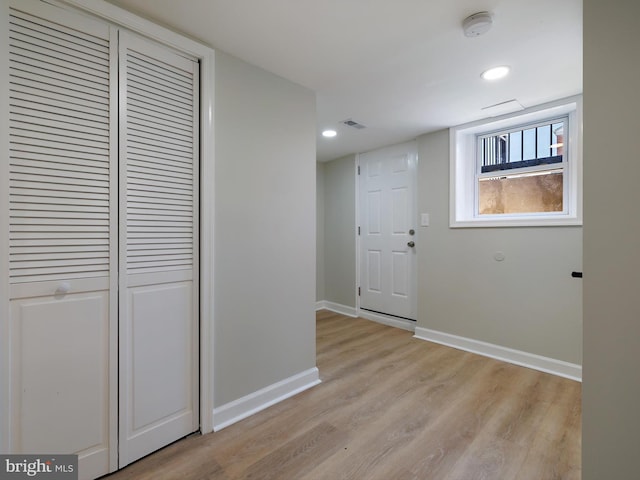 7907 Wallace Rd, Dundalk, MD 21222 - hall with light wood-type flooring, baseboards, and recessed lighting