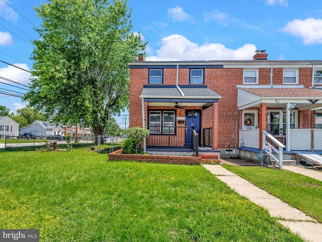 7907 Wallace Rd, Dundalk, MD 21222 - view of front facade featuring a chimney, covered porch, and brick siding