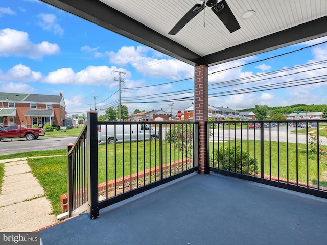 7907 Wallace Rd, Dundalk, MD 21222 - balcony with a ceiling fan and a residential view
