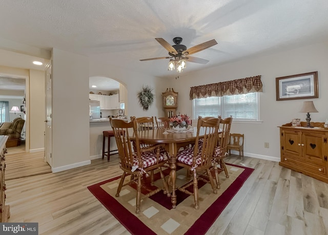 6165 Hawthorne Rd, La Plata, MD 20646 - dining space with arched walkways, ceiling fan, light wood-style flooring, baseboards, and recessed lighting