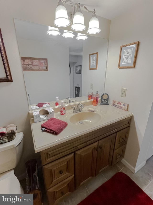 6165 Hawthorne Rd, La Plata, MD 20646 - bathroom featuring vanity, toilet, and tile patterned flooring