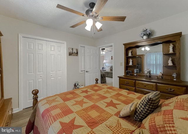 6165 Hawthorne Rd, La Plata, MD 20646 - bedroom featuring wood finished floors, a ceiling fan, and a closet