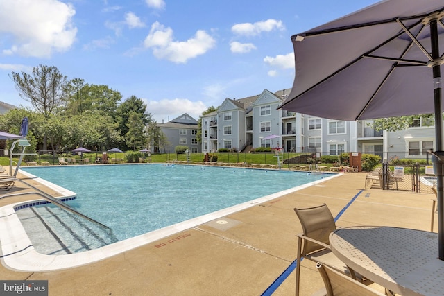 538 Copley Pl Unit 1-A, Gaithersburg, MD 20878 - community pool with a patio and a residential view