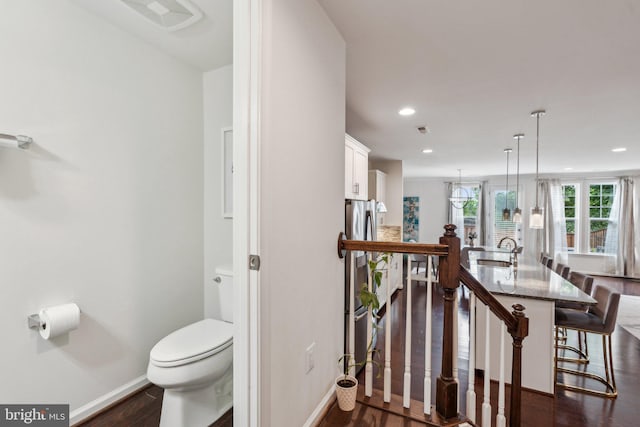 42533 Benfold Sq, Brambleton, VA 20148 - dining space featuring baseboards, dark wood-type flooring, and recessed lighting