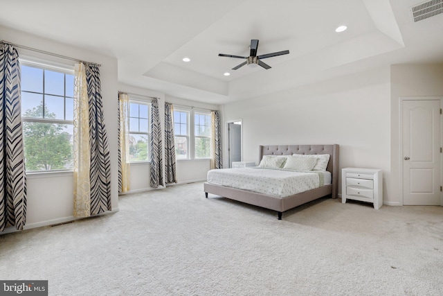 42533 Benfold Sq, Brambleton, VA 20148 - carpeted bedroom featuring a tray ceiling, baseboards, recessed lighting, and a ceiling fan