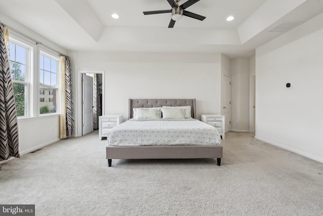 42533 Benfold Sq, Brambleton, VA 20148 - bedroom with light carpet, baseboards, a raised ceiling, and recessed lighting