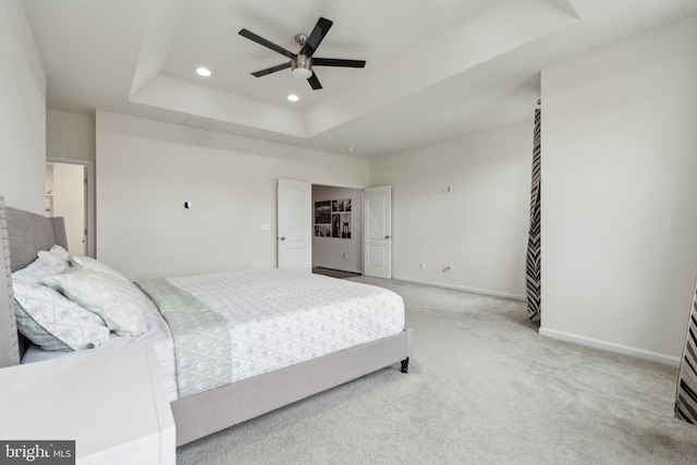 42533 Benfold Sq, Brambleton, VA 20148 - bedroom featuring a tray ceiling, recessed lighting, carpet, baseboards, and a ceiling fan