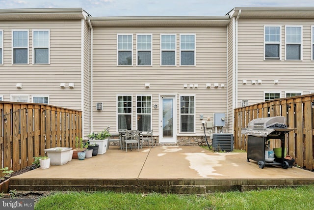 42533 Benfold Sq, Brambleton, VA 20148 - rear view of property with a patio area, cooling unit, and a fenced backyard
