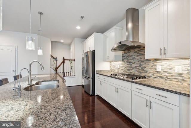 42533 Benfold Sq, Brambleton, VA 20148 - kitchen featuring wall chimney range hood, stainless steel appliances, a sink, white cabinets, and recessed lighting